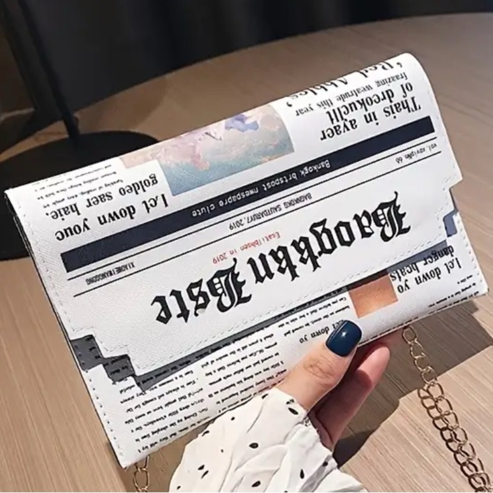 Tabloid Print White Clutch Bag